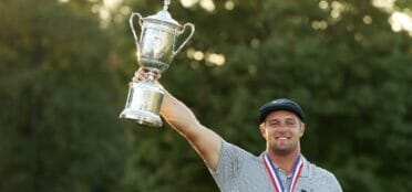 Bryson DeChambeau of the United States celebrates with the championship trophy after winning the 120th U.S. Open Championship on September 20, 2020