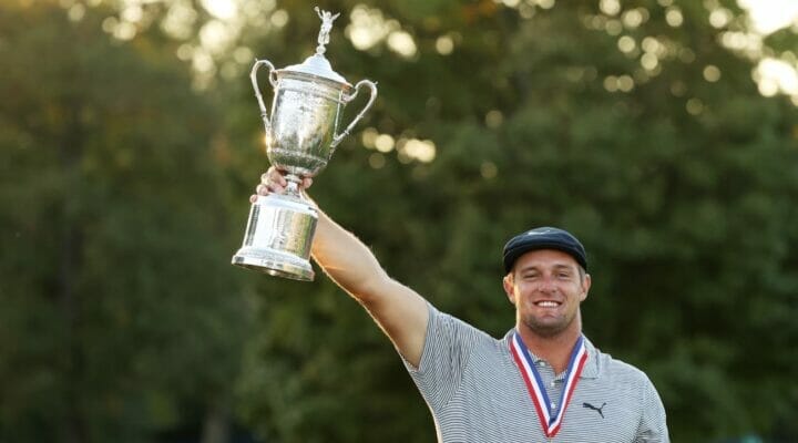 Bryson DeChambeau of the United States celebrates with the championship trophy after winning the 120th U.S. Open Championship on September 20, 2020