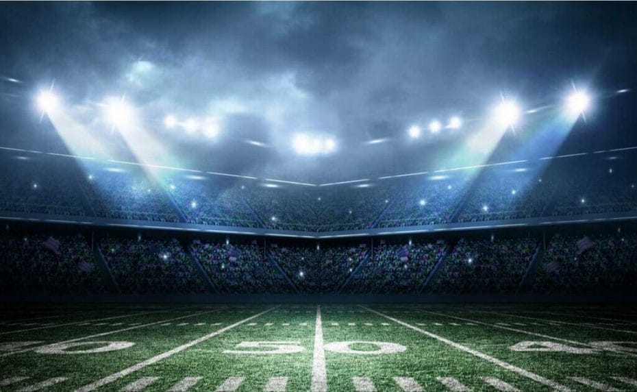 American football field lit up at night.
