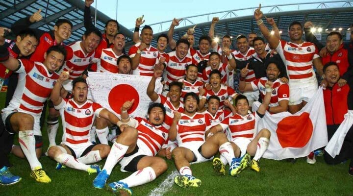 The Japanese rugby team celebrates after beating South Africa during the Rugby World Cup 2015. Photo by Steve Haag/Gallo Images/Getty Images