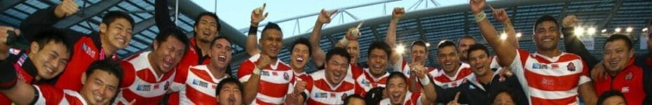 he Japanese rugby team celebrates after beating South Africa during the Rugby World Cup 2015. Photo by Steve Haag/Gallo Images/Getty Images