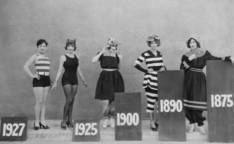 Women wearing the swimming fashions of various eras.