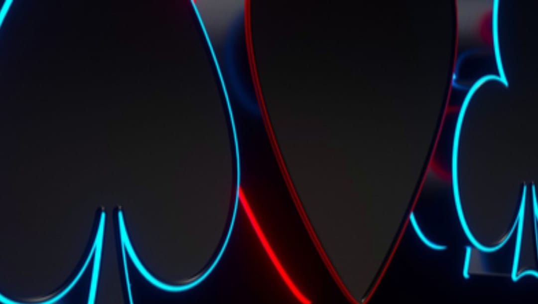 Neon diamond, clubs, heart, spades symbols against a black backdrop.