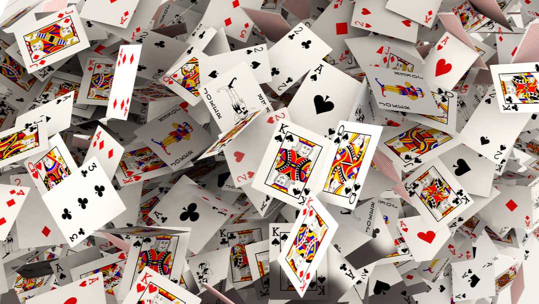 3D rendering of falling playing cards.