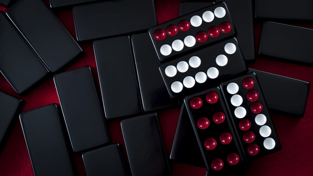 Chinese pai gow tiles on a red background.