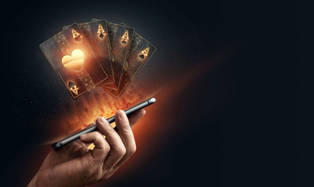 3d illustration of virtual playing cards featured above a smartphone.
