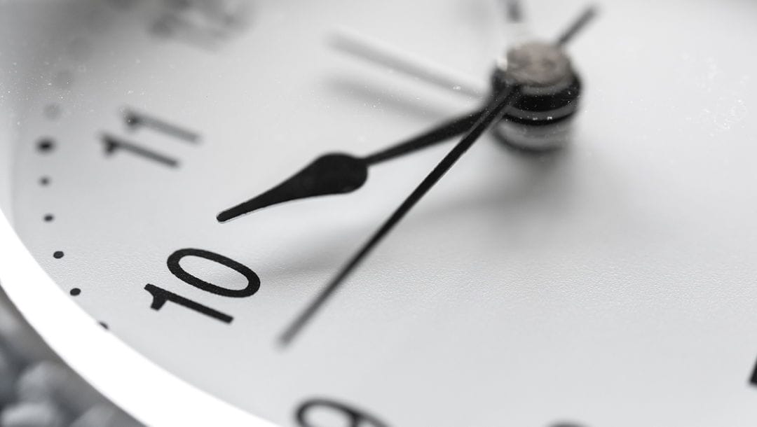 Close up of a clock face.