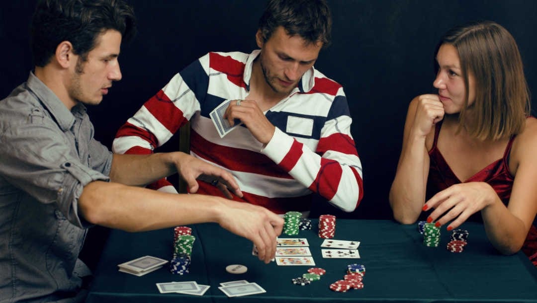 A group of friends playing a game of poker.