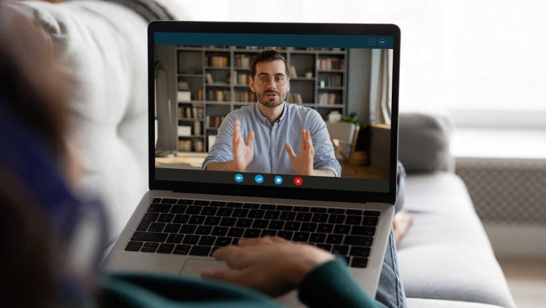 A person receives online coaching.