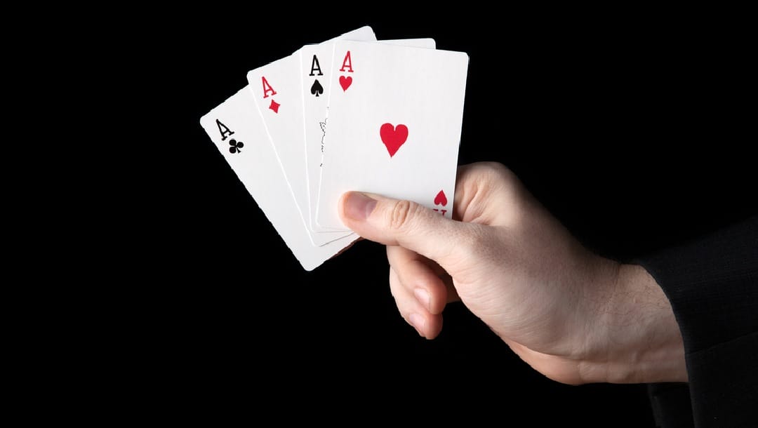 A poker hand with four aces