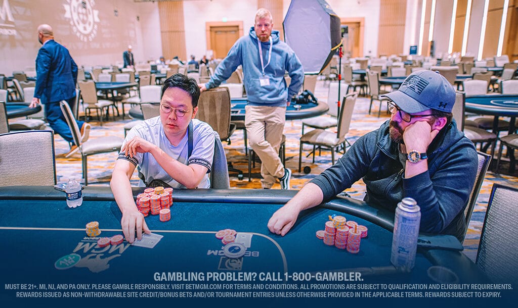 Two professional poker players playing in a poker tournament.