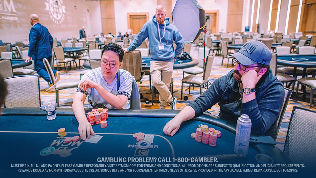 Two professional poker players playing in a poker tournament.