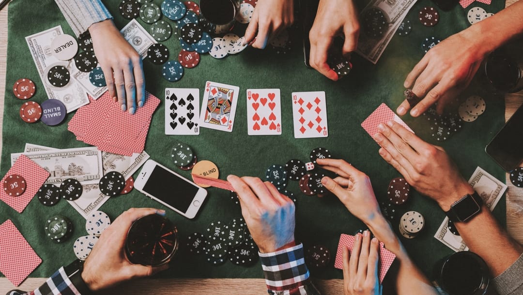 Birds eye view photograph taken in the middle of a poker game