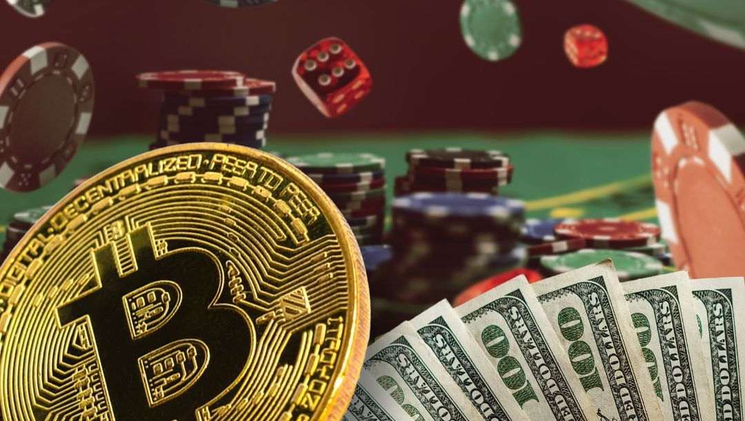 Floating poker chips and stacks of poker chips in the background of an image with cash and a gold Bitcoin in the foreground.