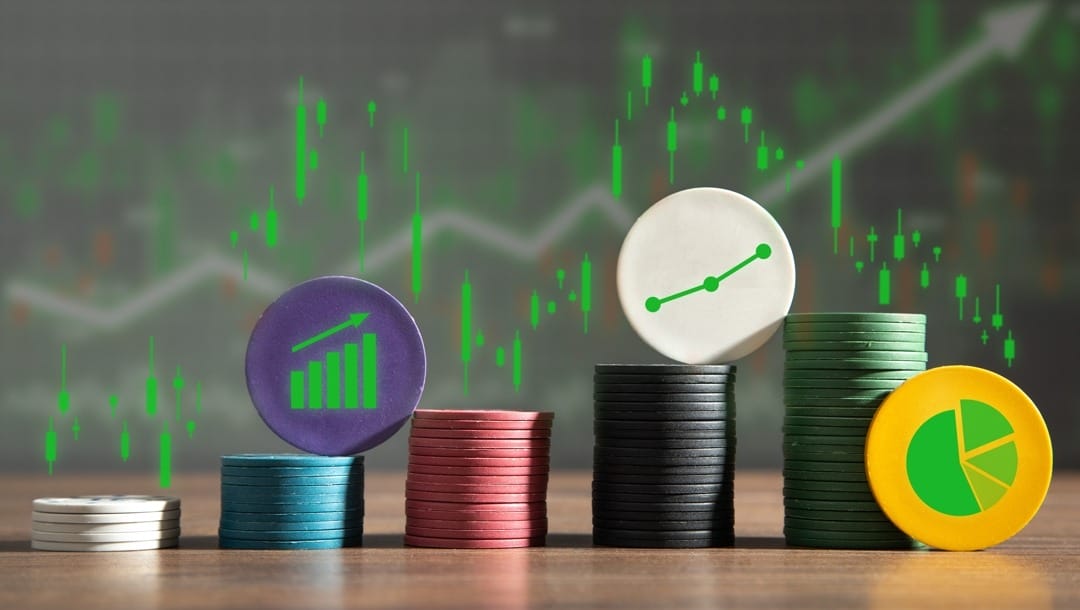 Poker chips decorated with charts and graphs