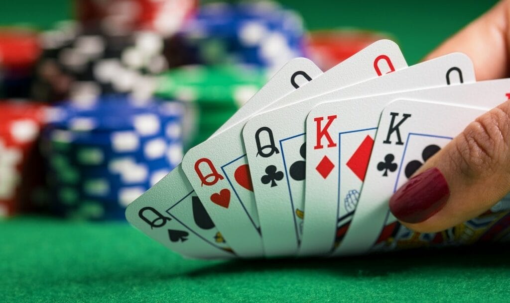 An upturned hand of cards on a poker table