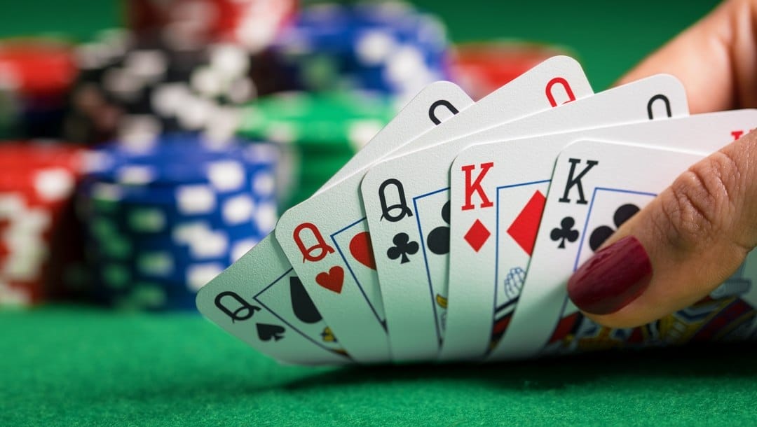 An upturned hand of cards on a poker table
