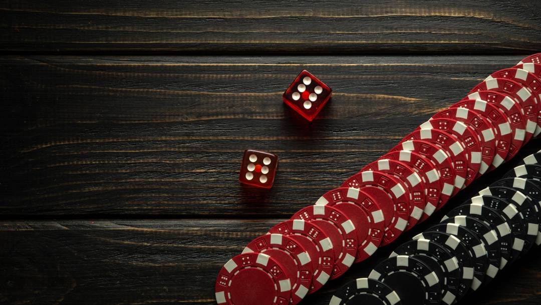 Croupier or casino dealer at gambling club or casino