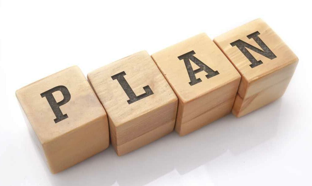 Wooden blocks with the word “Plan” printed on them.