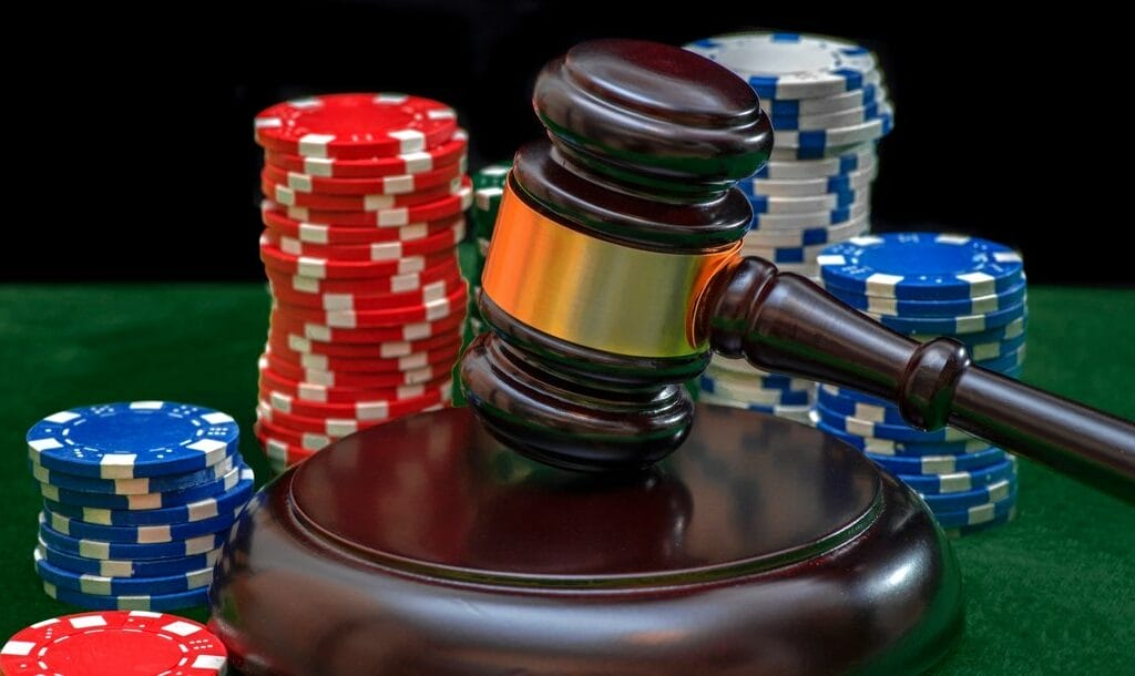 Judicial gavel and casino chips.