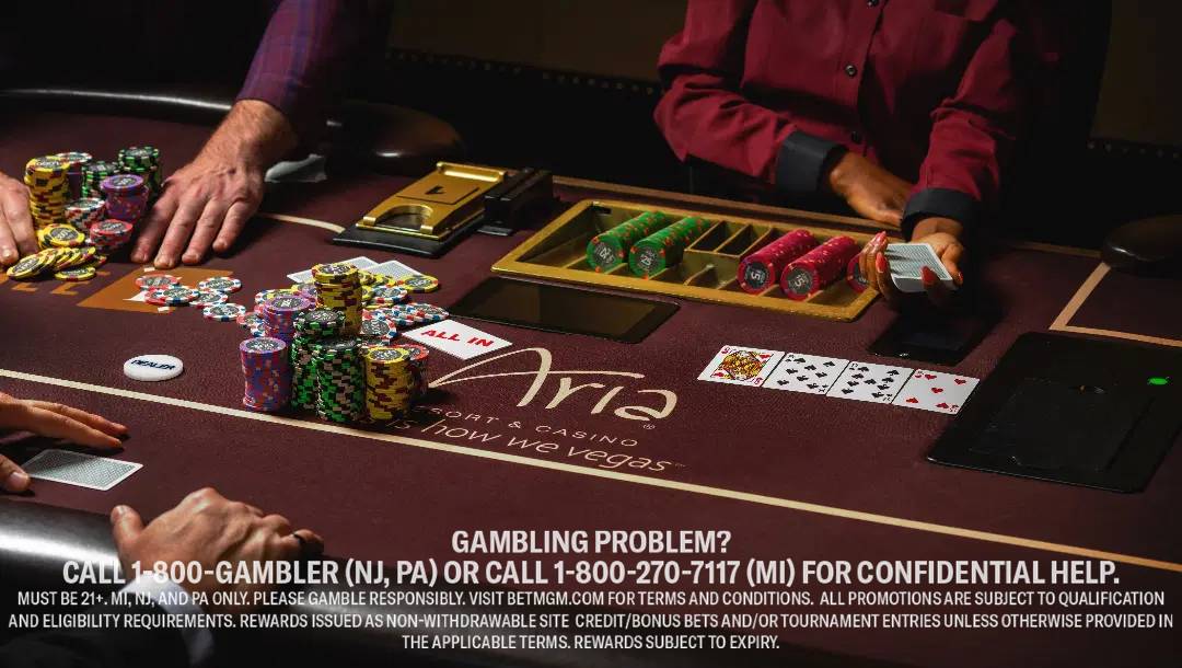 People engage in a casino card game with chips on the table, a dealer handling cards.