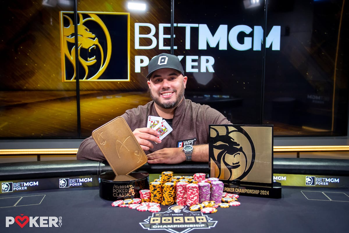 Daniel Maor sitting at a poker table with a stack of poker chips in front of him. Photo credit PokerOrg/8131 Media