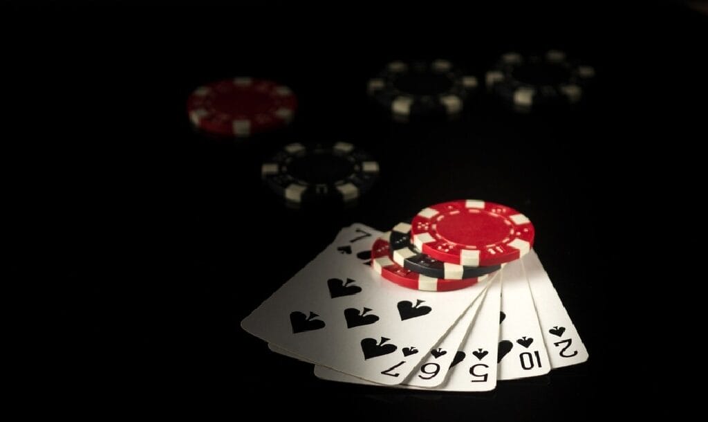 poker-hand-with-poker-chips