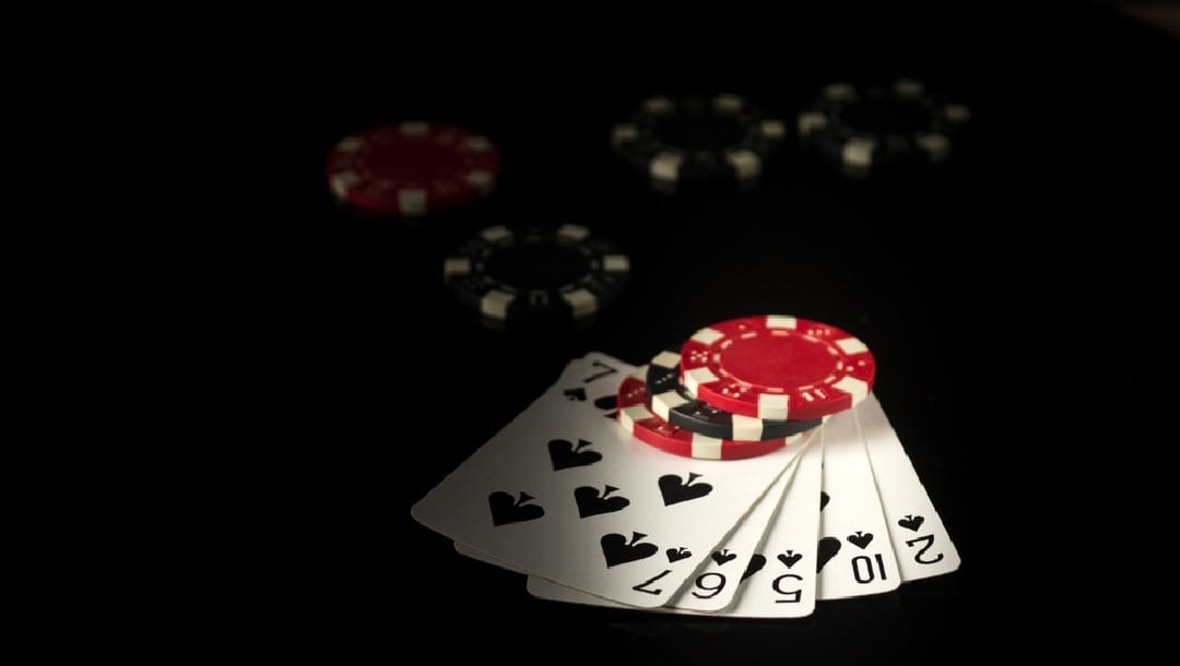 poker-hand-with-poker-chips