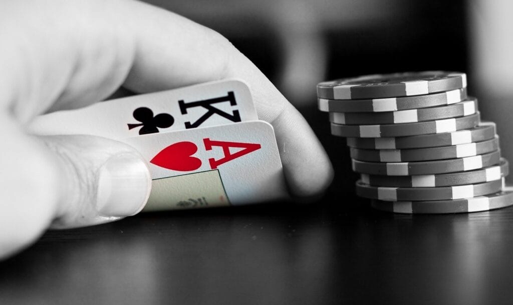 A-poker-player-reveals-a-king-and-ace-hole-cards-Ace-king