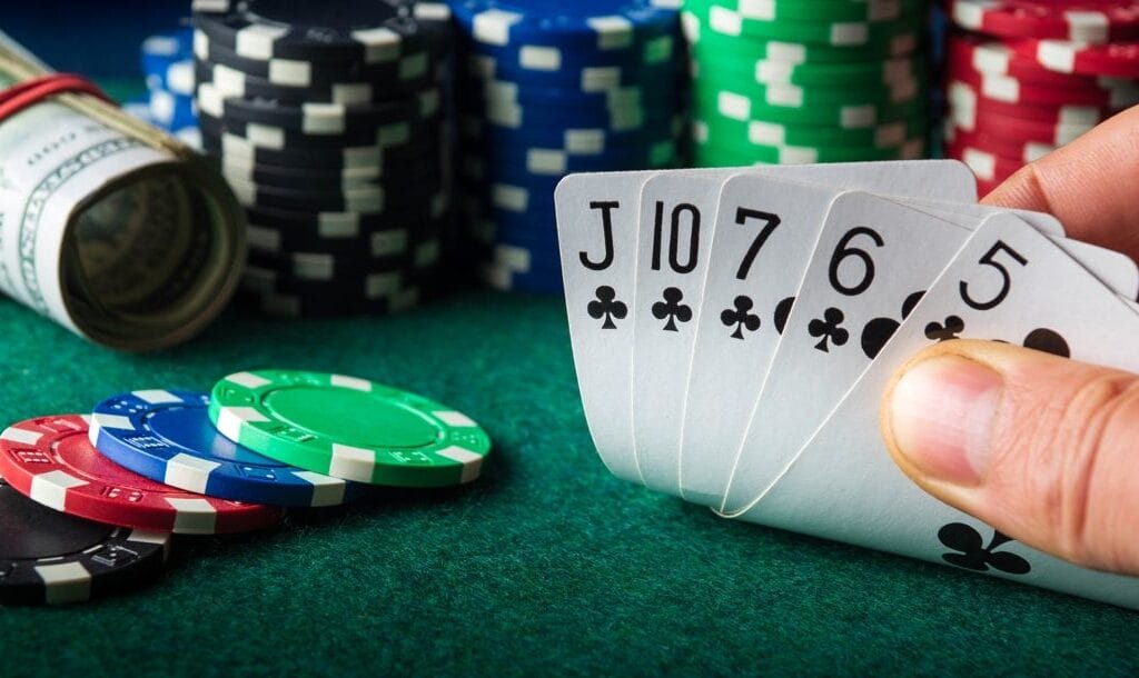 A-poker-player-checks-his-flush-hand-Playing-flush-draws