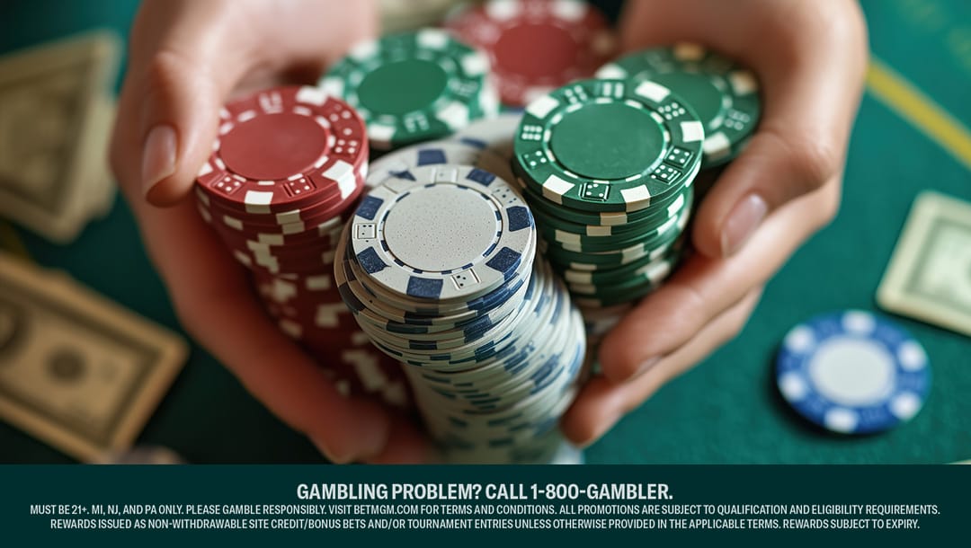 Hands holding stacks of poker chips above a casino table with cash visible.