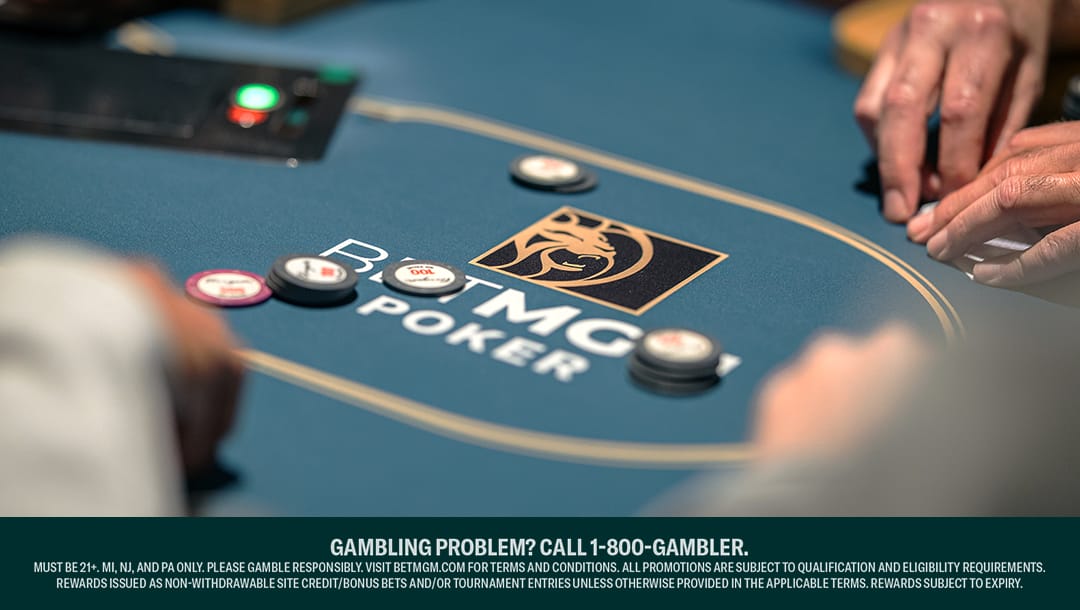 A poker table set with various chips and cards, indicating readiness for a game of poker.