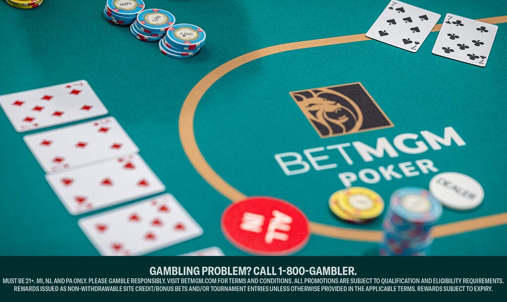 A BetMGM Poker table with community cards on the left and a poker hand on the right. Stacks of poker chips are also visible on the table.